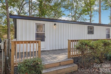 Experience the allure of lake life with 128 feet of Lake Front - photo 2