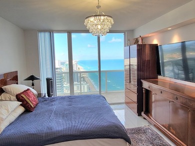 Oceanfront living at its finest! 2-story Penthouse Condo at the - photo 11