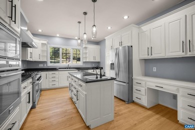 Set on nearly 6 park-like acres with frontage on Ivy Creek this - photo 14