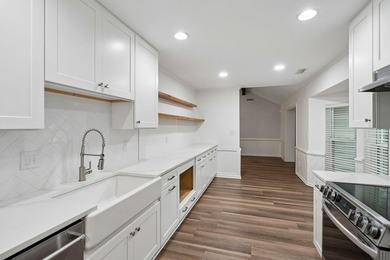 Discover this wonderful three-bedroom, two-bathroom brick ranch - photo 22