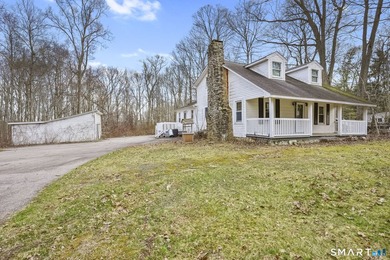 Tucked away on a private rural lot in scenic Salem, this - photo 1