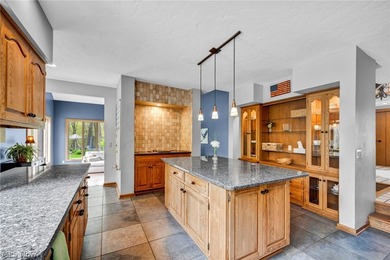 Nestled on a breathtaking wooded lot on the - photo 12