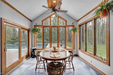 Nestled on a breathtaking wooded lot on the - photo 13