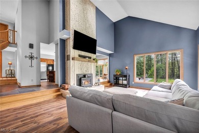 Nestled on a breathtaking wooded lot on the - photo 18