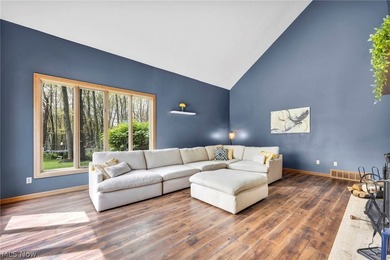 Nestled on a breathtaking wooded lot on the - photo 19