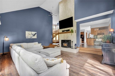 Nestled on a breathtaking wooded lot on the - photo 20