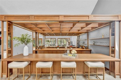 Nestled on a breathtaking wooded lot on the - photo 22