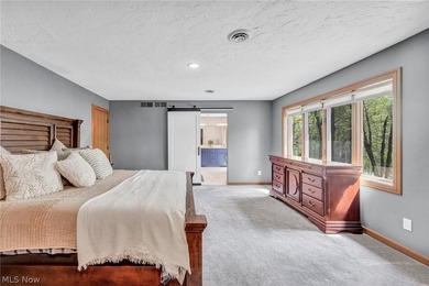 Nestled on a breathtaking wooded lot on the - photo 25