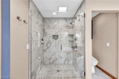 Nestled on a breathtaking wooded lot on the - photo 28