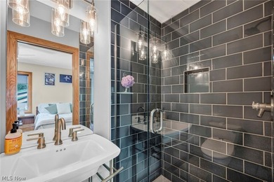 Nestled on a breathtaking wooded lot on the - photo 31