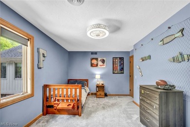 Nestled on a breathtaking wooded lot on the - photo 32