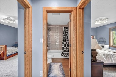 Nestled on a breathtaking wooded lot on the - photo 34