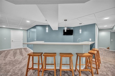 Nestled on a breathtaking wooded lot on the - photo 40