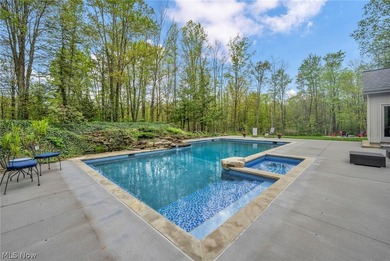 Nestled on a breathtaking wooded lot on the - photo 43
