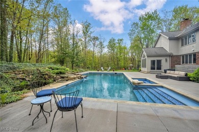 Nestled on a breathtaking wooded lot on the - photo 44