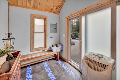 Nestled on a breathtaking wooded lot on the - photo 47