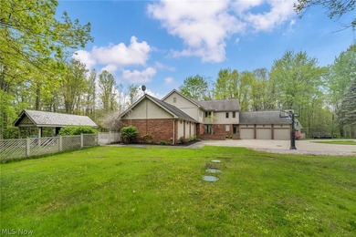 Nestled on a breathtaking wooded lot on the - photo 49