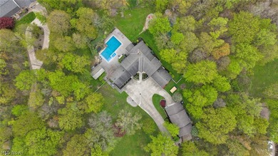 Nestled on a breathtaking wooded lot on the - photo 50