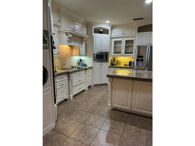 This is a traditional, beautiful brick veneer home on a 1/2 + - photo 15