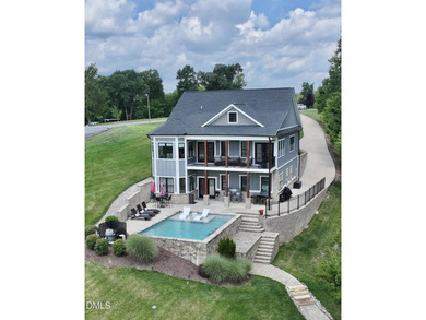 Located in the highly sought after community at Hyco Lake, The - photo 1