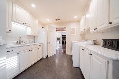 Must See: This large entryway invites you to fall in love with