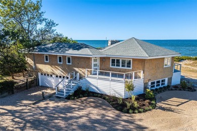 Beautiful, expansive soundfront retreat offering rare, direct - photo 1