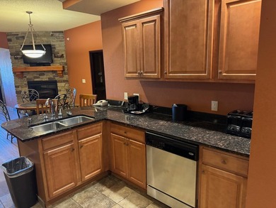 Located on the fifth floor, this spacious three bedroom condo - photo 10
