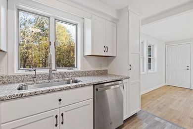 Welcome to 472 Dunn Road in Belgrade, a beautifully renovated - photo 6