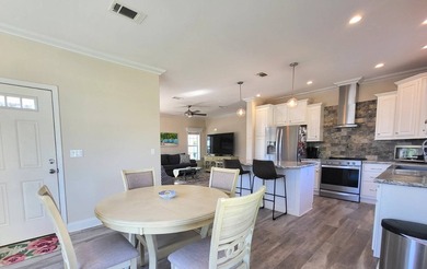 A fabulous open concept floor plan allowing sunlight to flow - photo 8