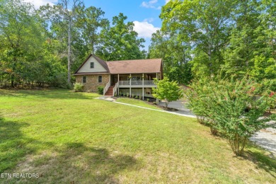 This beautiful 1  1/2 story Craftsman style home with - Lake Home Sale Pending in Rockwood, Tennessee