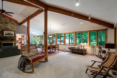 Set on nearly 6 wooded acres, this contemporary custom home - photo 13