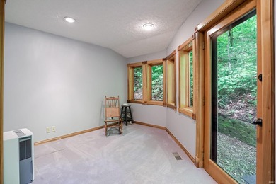Set on nearly 6 wooded acres, this contemporary custom home - photo 15