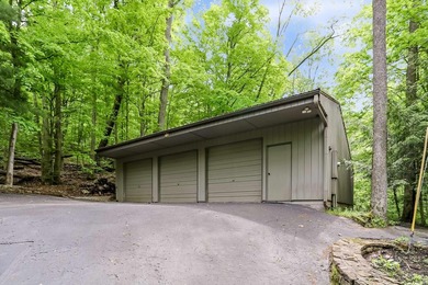Set on nearly 6 wooded acres, this contemporary custom home - photo 34