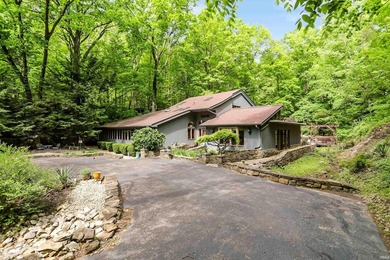 Set on nearly 6 wooded acres, this contemporary custom home - photo 36