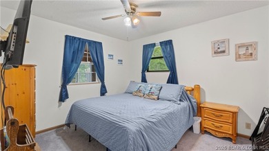 Discover peaceful lakefront living in this charming home tucked - photo 13