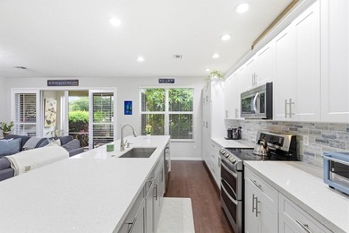 Beautifully updated newer-construction townhome in the - photo 13
