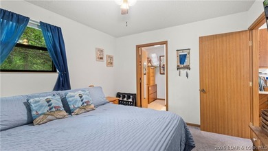 Discover peaceful lakefront living in this charming home tucked - photo 14