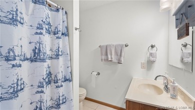 Discover peaceful lakefront living in this charming home tucked - photo 17