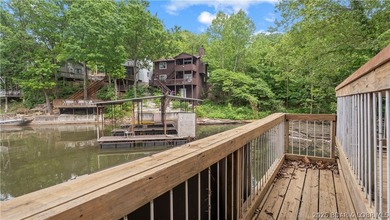 Discover peaceful lakefront living in this charming home tucked - photo 48
