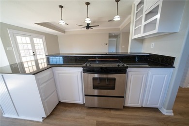 Step into this beautifully refreshed four-sided brick home - photo 8