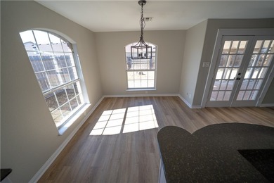 Step into this beautifully refreshed four-sided brick home - photo 9