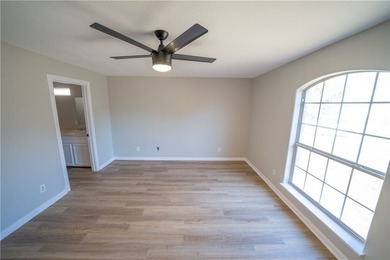 Step into this beautifully refreshed four-sided brick home - photo 10