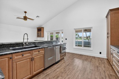 Welcome to this beautifully updated home located in the highly - photo 12