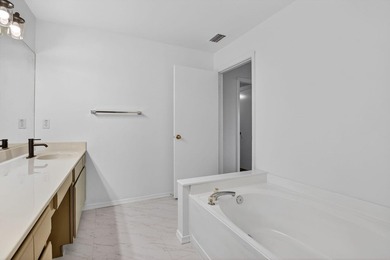 Welcome to this beautifully updated home located in the highly - photo 17