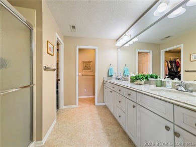WOW! WHAT A VIEW! THIS CONDO SITS ON THE WATER'S EDGE AT LAKE OF - photo 23