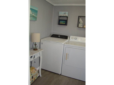 Step into your own slice of coastal paradise with this - photo 26