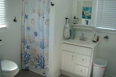 Step into your own slice of coastal paradise with this - photo 32