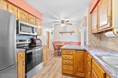 Welcome to 4089 N. Pine Dell Dr in Lansing, a well-maintained - photo 15
