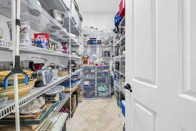 Welcome to luxury, low-maintenance living in the prestigious - photo 19