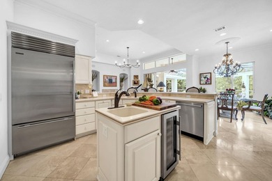 Welcome to luxury, low-maintenance living in the prestigious - photo 21
